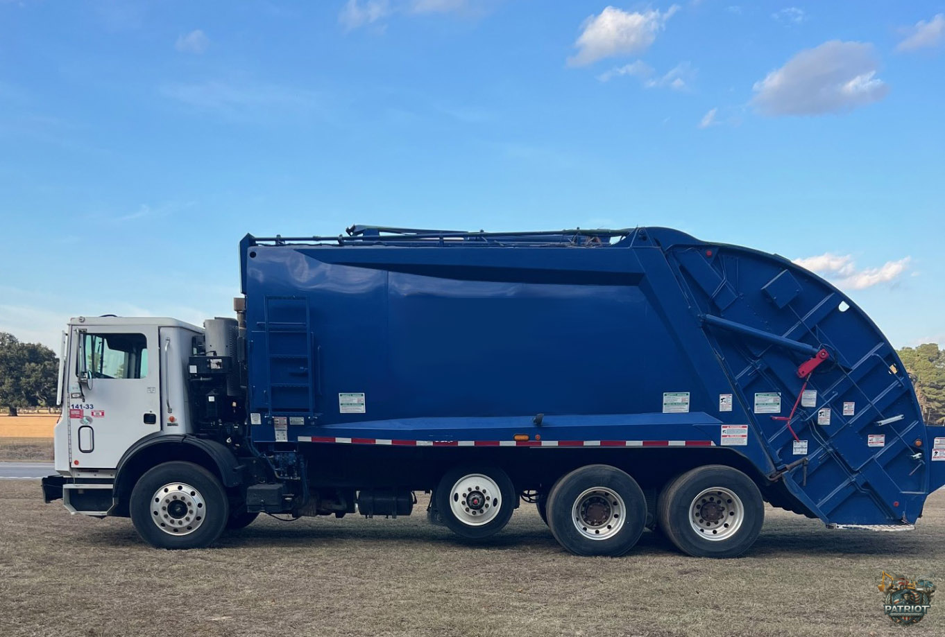 2017 Mack 28Yd McNeilus Rear Loader (RL) body Tri-axle Refuse Truck